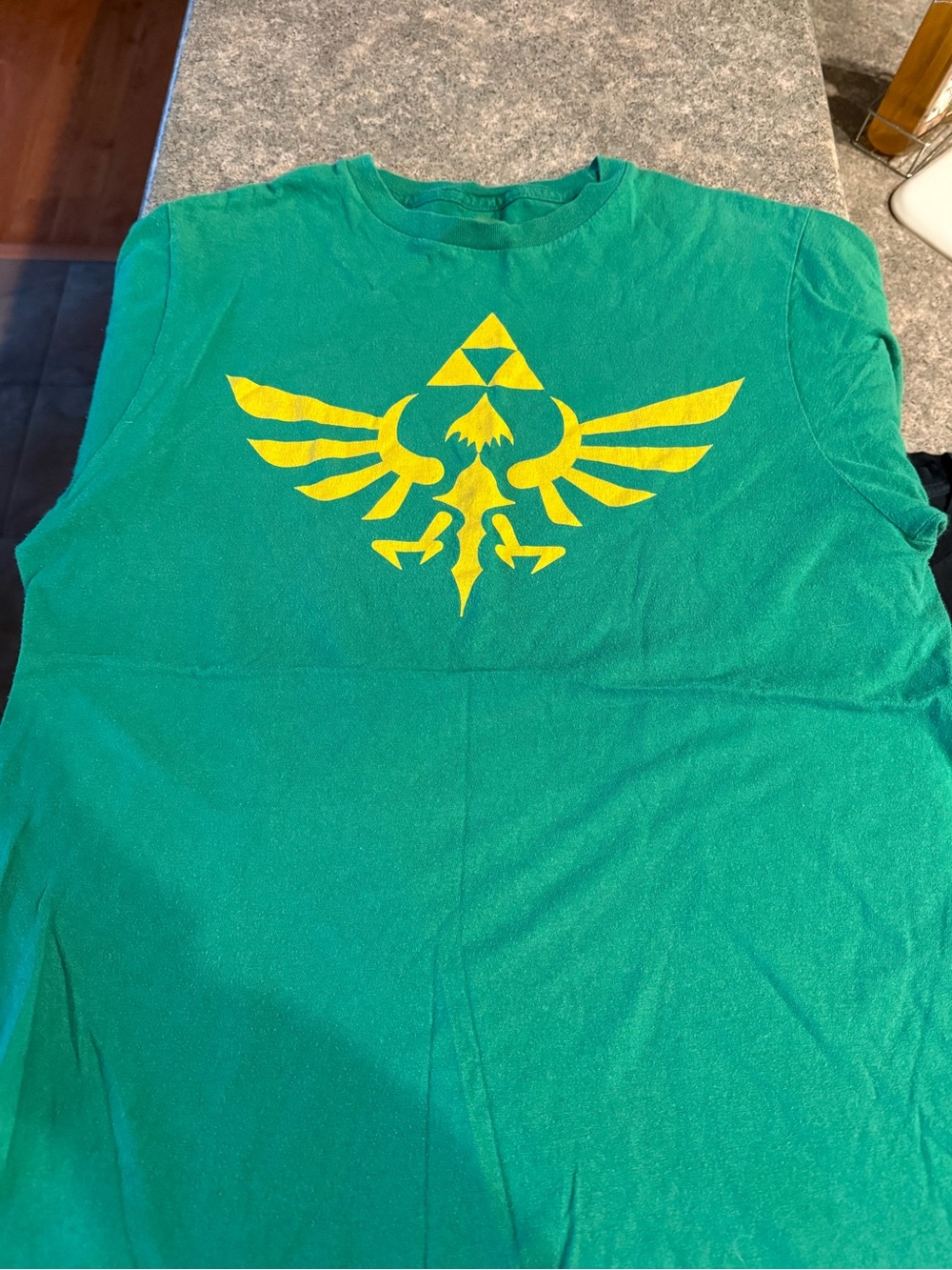 Nintendo Green Short Sleeve Tee with Yellow Zelda Triforce Graphic